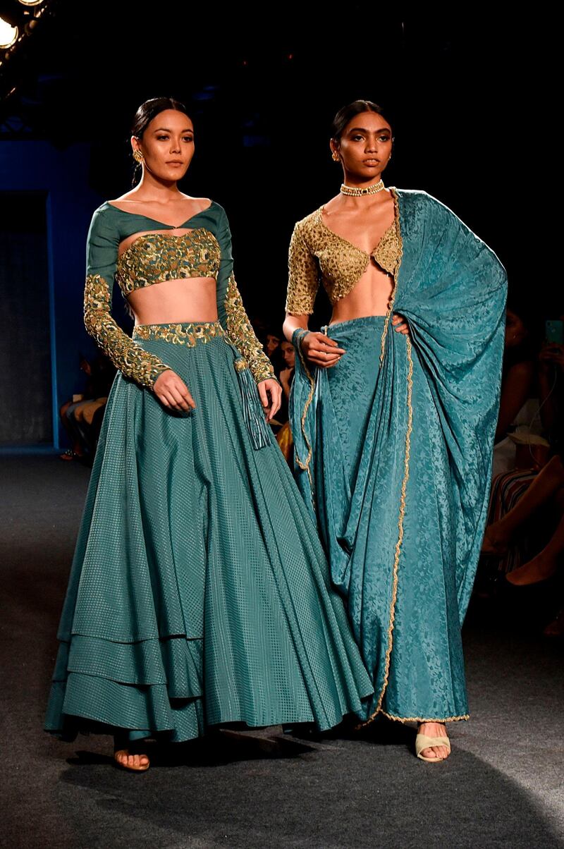Model present creations by designer Kavita Agrwal at the Lakmé Fashion Week (LFW) Winter/Festive 2019 in Mumbai on August 25, 2019.  - XGTY / RESTRICTED TO EDITORIAL USE
 / AFP / Sujit Jaiswal / XGTY / RESTRICTED TO EDITORIAL USE
