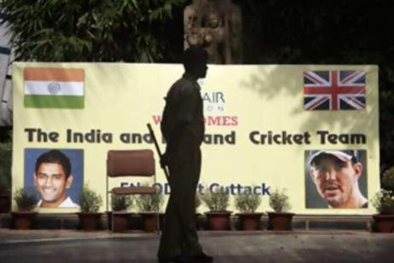 Indian security personnel stand guard outside the England team hotel in Bhubaneswar.