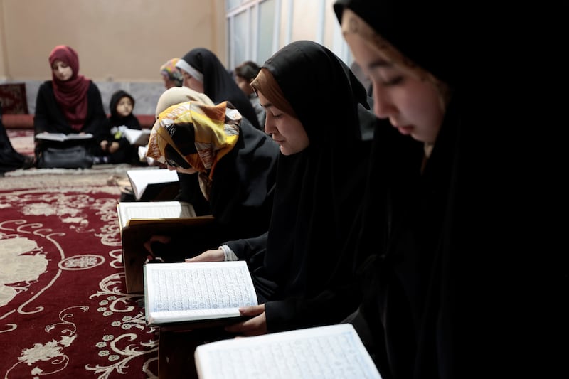 Afghan women and girls studying at a Kabul madrassa. There has been a surge in enrolments to religious schools. Reuters