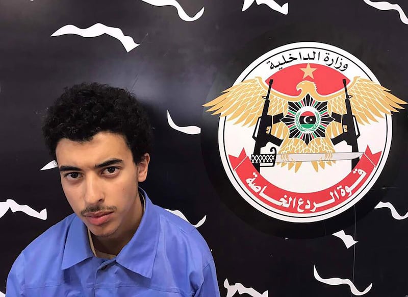 A photo released on the Facebook page of Libya's Ministry of Interior's Special Deterrence Force on May 24, 2017 claims to shows Hashem Abedi, the brother of the man suspected of carrying out the bombing in the British city of Manchester, after he was detained in Tripoli for alleged links to the Islamic State (IS) group.
Libya arrested a brother and father of Salman Abedi who is suspected of the bombing at a pop concert killing 22 people, including children on May 22, 2017. / AFP PHOTO / LIBYA'S SPECIAL DETERRENCE FORCE / HO / RESTRICTED TO EDITORIAL USE - MANDATORY CREDIT "AFP PHOTO / LIBYA'S SPECIAL DETERRENCE FORCE" - NO MARKETING NO ADVERTISING CAMPAIGNS - DISTRIBUTED AS A SERVICE TO CLIENTS

