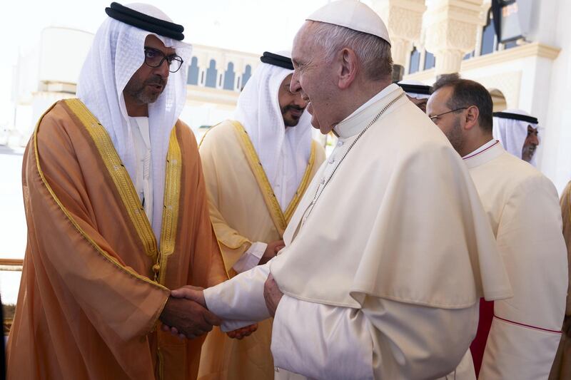 ABU DHABI, UNITED ARAB EMIRATES - February 05, 2019: Day three of the UAE Papal visit - HH Sheikh Hamed bin Zayed Al Nahyan, Chairman of the Crown Prince Court of Abu Dhabi and Abu Dhabi Executive Council Member (L), bids farewell to His Holiness Pope Francis, Head of the Catholic Church (R), at the Presidential Airport. 


( Mohamed Al Hammadi / Ministry of Presidential Affairs )
---
