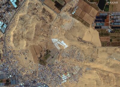 A satellite image shows an overview of a tent camp settlement near Rafah. Maxar Technologies / Reuters