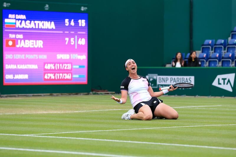 Ons Jabeur celebrates after winning match point against Daria Kasatkina.