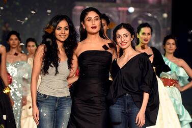 Kareena Kapoor Khan with designers Gauri and Kanika at Lakme Fashion Week. Photo: Sujit Jaiswal / AFP 