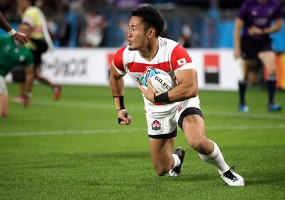 Japan's Kenki Fukuoka reacts after scoring a try during the Rugby World Cup Pool A game at Shizuoka Stadium Ecopa between Japan and Ireland in Shizuoka, Japan, Saturday, Sept. 28, 2019. (AP Photo/Jae Hong)