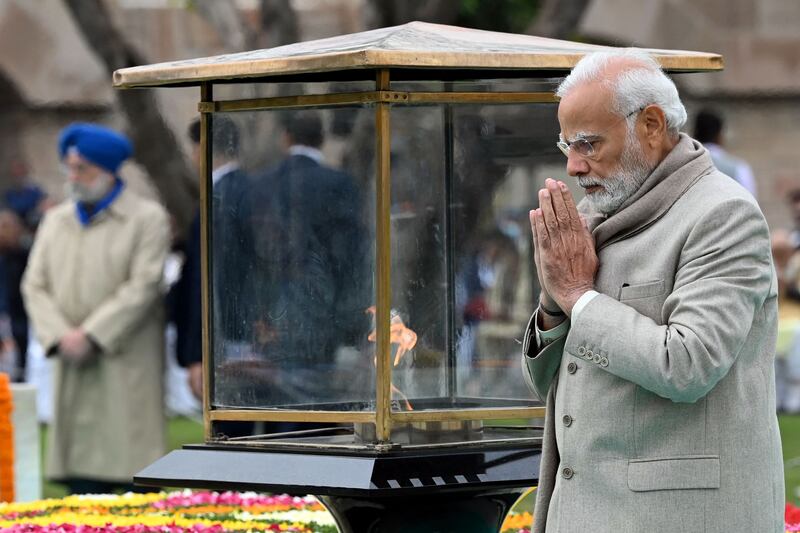 India's Prime Minister Narendra Modi pays his respects at the Gandhi memorial in New Delhi. AFP