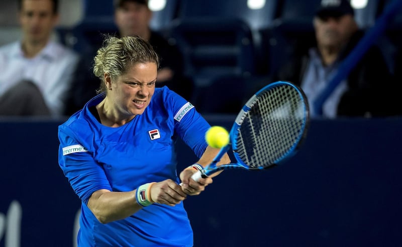 epa08268307 Kim Clijsters of Belgium in action against Johanna Konta of Britain during the women's singles match at the Monterrey Open tennis tournament in Monterrey, Mexico, 03 March 2020.  EPA/MIGUEL SIERRA