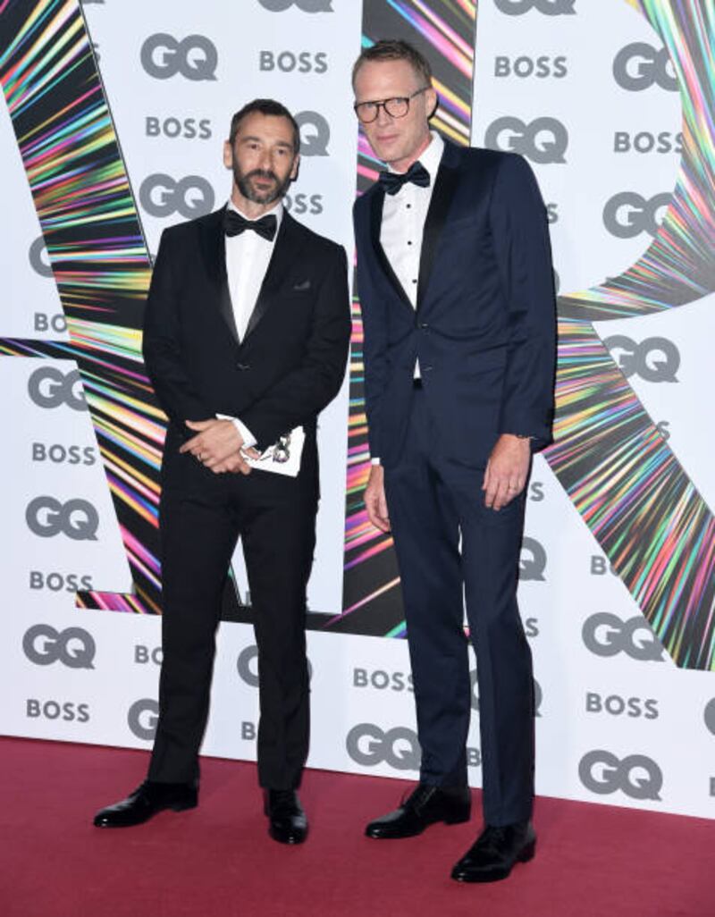 Paul Bettany, right, attends the GQ Men of the Year Awards at the Tate Modern on September 1, 2021 in London, England. Getty Images