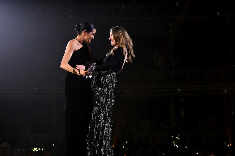LONDON, ENGLAND - DECEMBER 10: Meghan, Duchess of Sussex presents the award for British Designer of the Year Womenswear Award to Clare Waight Keller for Givenchy during The Fashion Awards 2018 In Partnership With Swarovski at Royal Albert Hall on December 10, 2018 in London, England.  (Photo by Joe Maher/BFC/Getty Images)