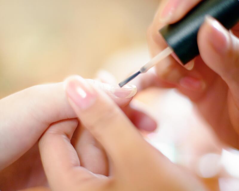 Close-up Of Beautician Applying Nail Varnish To Woman (Getty Images) *** Local Caption ***  al05de-top10-vaniday.jpg