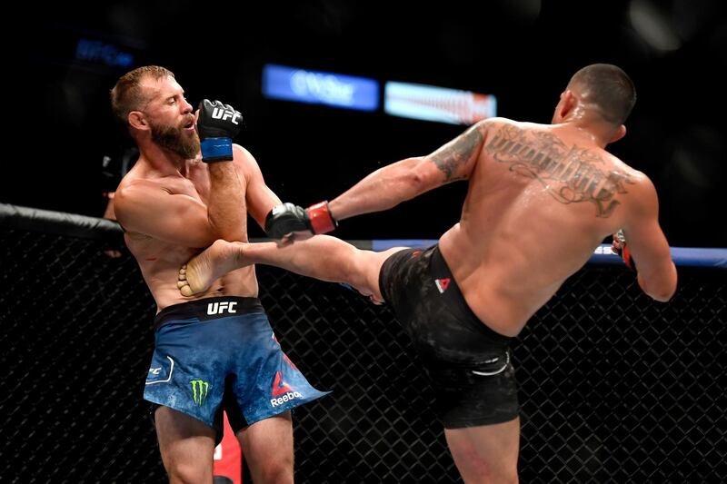 JACKSONVILLE, FLORIDA - MAY 09: Anthony Pettis (R) of the United States kicks Donald Cerrone (L) of the United States in their Welterweight fight during UFC 249 at VyStar Veterans Memorial Arena on May 09, 2020 in Jacksonville, Florida.   Douglas P. DeFelice/Getty Images/AFP