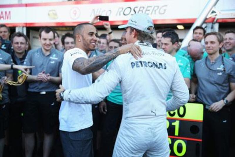 Lewis Hamilton, left, apologised to his Mercedes team after an error cost them a 1-2 finish at the Monaco Grand Prix. Mark Thompson / Getty Images