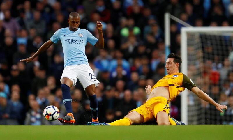 Soccer Football - Premier League - Manchester City v Brighton & Hove Albion - Etihad Stadium, Manchester, Britain - May 9, 2018   Manchester City's Fernandinho in action with Brighton's Lewis Dunk         Action Images via Reuters/Jason Cairnduff    EDITORIAL USE ONLY. No use with unauthorized audio, video, data, fixture lists, club/league logos or "live" services. Online in-match use limited to 75 images, no video emulation. No use in betting, games or single club/league/player publications.  Please contact your account representative for further details.