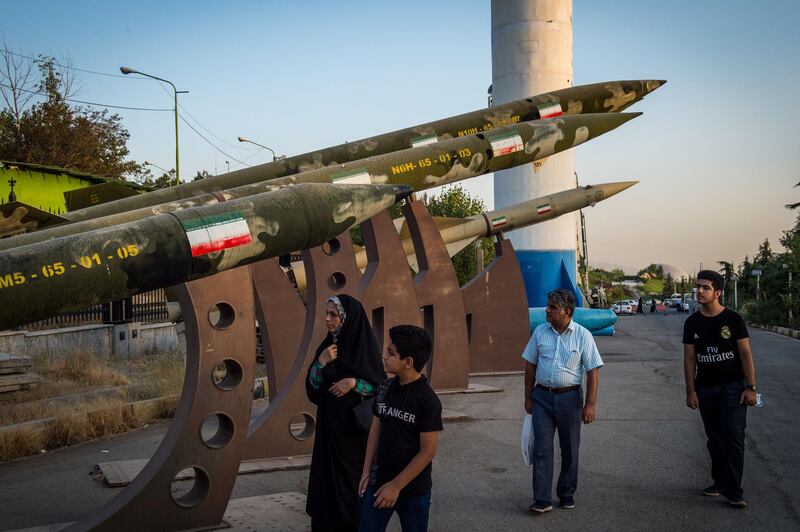 Visitors look at a missile display at a military museum in Tehran, Iran, on Tuesday, Sept. 17. 2019. Iranian Foreign Minister Mohammad Javad Zarif refused to rule out military conflict in the Middle East after the U.S. sent more troops and weapons to Saudi Arabia in response to an attack on oil fields the U.S. has blamed on the Islamic Republic. Photographer: Ali Mohammadi/Bloomberg