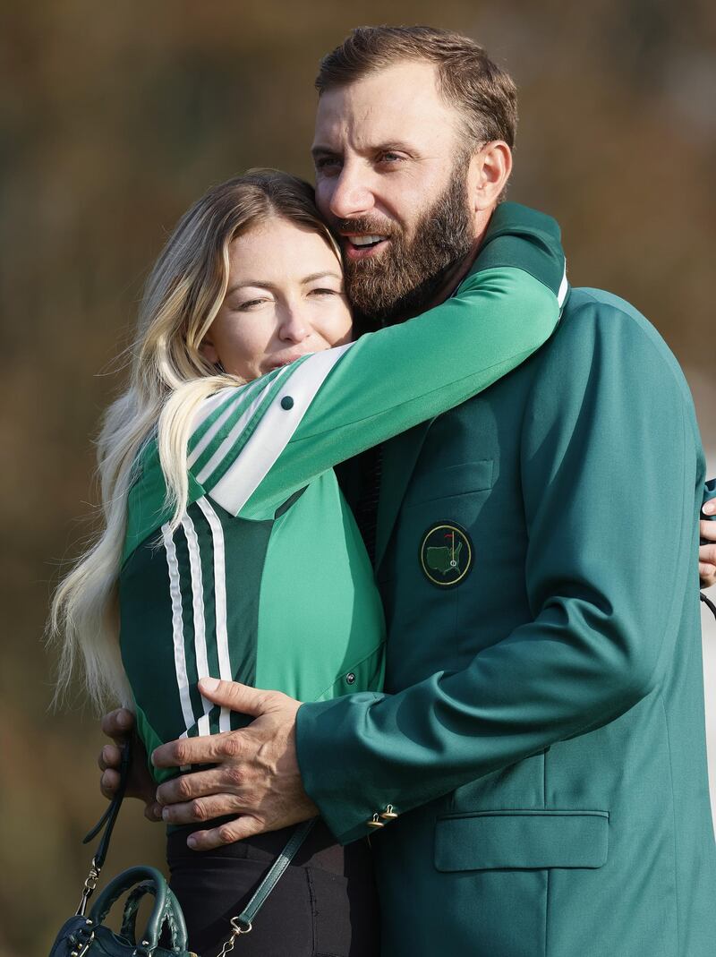 Dustin Johnson of the US is embraced by his fiancee Paulina Gretzky after winning the 2020 Masters at the Augusta National Golf Club in Augusta, Georgia. EPA