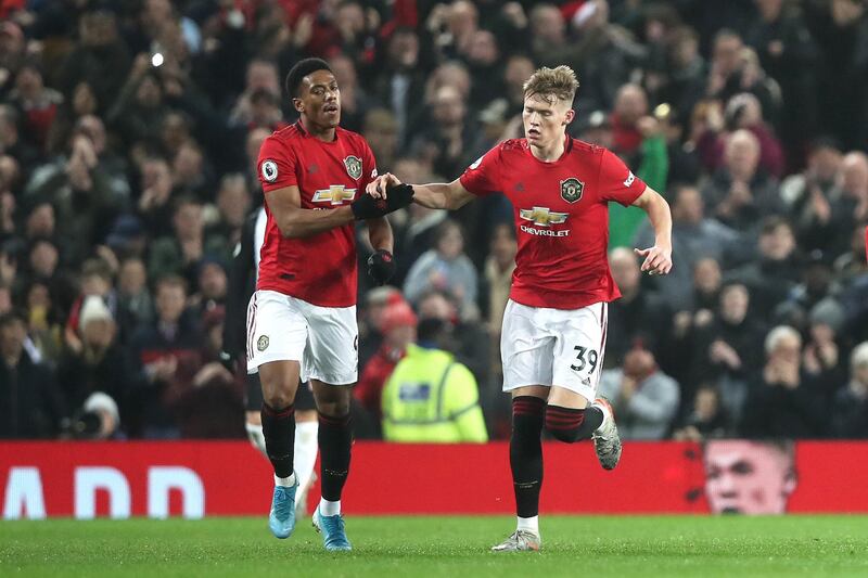 Anthony Martial celebrates with teammate Scott McTominay after scoring his team's first goal against Newcastle United. Getty Images
