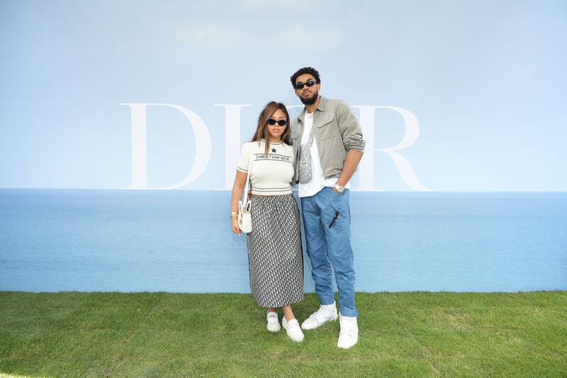 US socialite and reality star Jordyn Woods and Dominican-American basketball player Karl-Anthony Towns attend the Dior Homme photocall at Paris Fashion Week's menswear spring/summer 2023 show, on June 24, 2022. Getty Images For Christian Dior