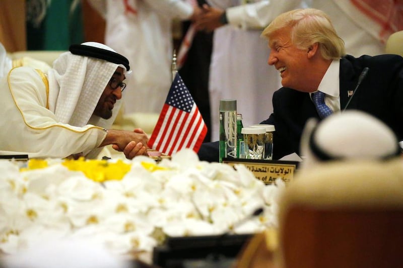 Donald Trump shakes hands with Sheikh Mohammed bin Zayed, Abu Dhabi Crown Prince and Deputy Supreme Commander of the UAE Armed Forces, as he sits down to a meeting with GCC leaders during their summit in Riyadh, Saudi Arabia on May 21, 2017. Jonathan Ernst / Reuters