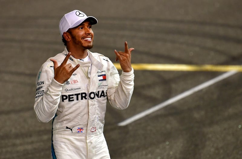 Mercedes' British driver Lewis Hamilton celebrates. AFP
