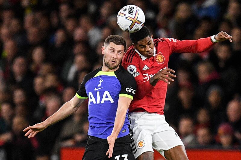 Tottenham defender Ben Davies fights for the ball with Manchester United's Marcus Rashford. AFP