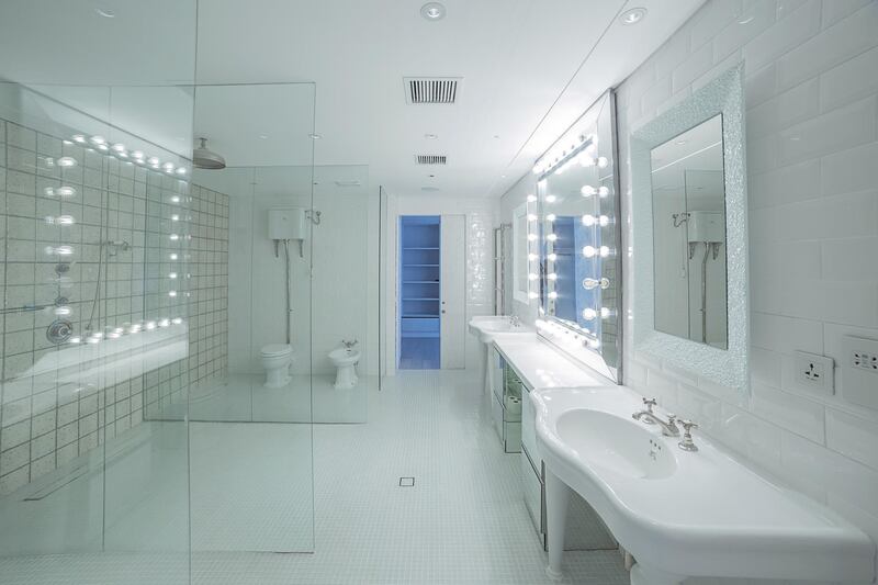 It has a bathroom for a movie star with lit-up vanity mirrors. Courtesy Allsopp & Allsopp