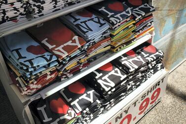 NEW YORK - MAY 10: Shirts bearing the "I Love New York" logo are displayed at a store in Times Square on May 10, 2010 in New York City. As a result of a $9.2 billion budget gap for the fiscal year that began April 1, New York State's "I Love New York" tourism office is proposing to cut tourism funding by 13 percent, from $12.2 million to $10.6 million. (Photo by Spencer Platt/Getty Images)