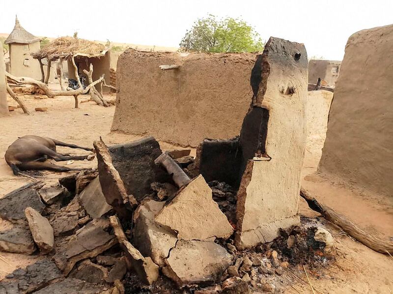 A destroyed home is seen on June 11, 2019 in the Dogon village of Sobane-Kou, near Sangha, after an attack that killed over 100 ethnic Dogon on June 9, 2019 evening. The attack came less than three months after nearly 160 members of the Fulani ethnic group were slaughtered by a group identified as Dogon. / AFP / STRINGER
