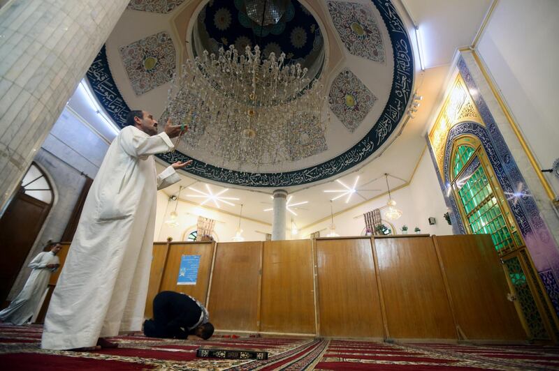 Men pray at Imam Ali Mosque, the first mosque to be built in Basra in 7th century, during Ramadan in south-east Iraq. Reuters