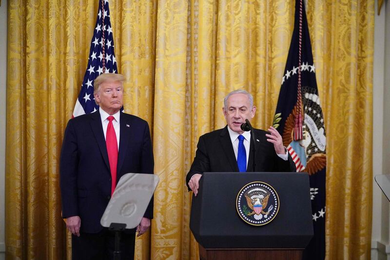 US President Donald Trump and Israeli Prime Minister Benjamin Netanyahu take part in an announcement of Trump's Middle East peace plan in the East Room of the White House in Washington. AFP