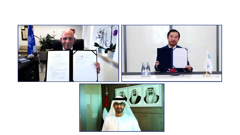 Professor Eric Xing, president of MBZUAI (top right) and Professor Alon Chen, president of the Weizmann Institute (top left), agreed the partnership at a virtual ceremony attended by Dr Sultan Al Jaber, Minister of Industry and Advanced Technology and chairman of MBZUAI's board of trustees (centre). Courtesy: MBZUAI