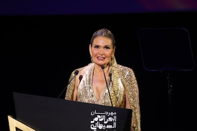Egyptian actress Yousra speaks onstage during the opening gala of the  Red Sea International Film Festival. Getty Images