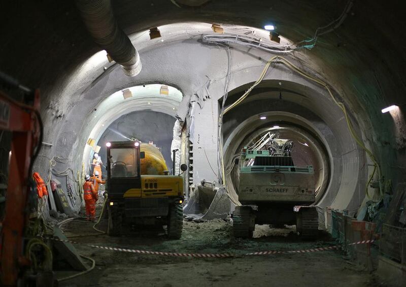 Concrete is spayed (left) on a crossover rail tunnel. Peter Macdiarmid / Getty Images