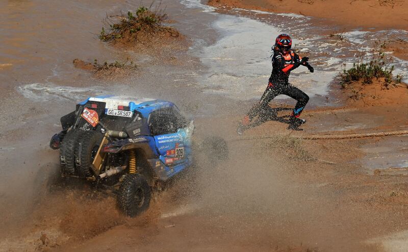 Black Horse Team's Saleh Al Saif and co-driver Joao Pedro Vitoria during the Dakar Rally in Saudi Arabia. AFP