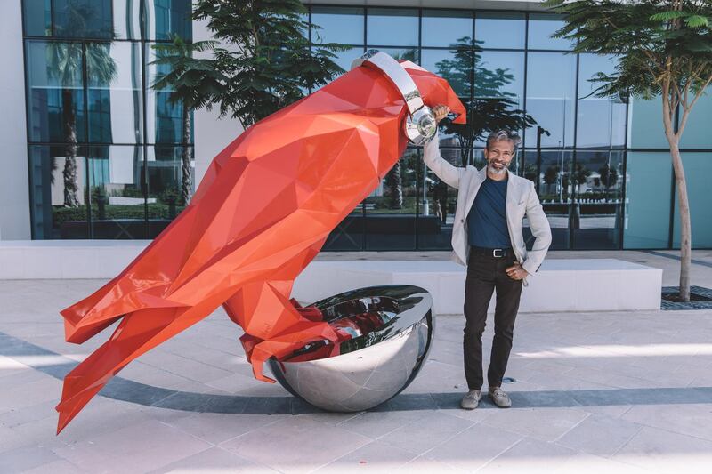 Neel Shukla with his falcon sculpture. Radisson Red Dubai Silicon Oasis
