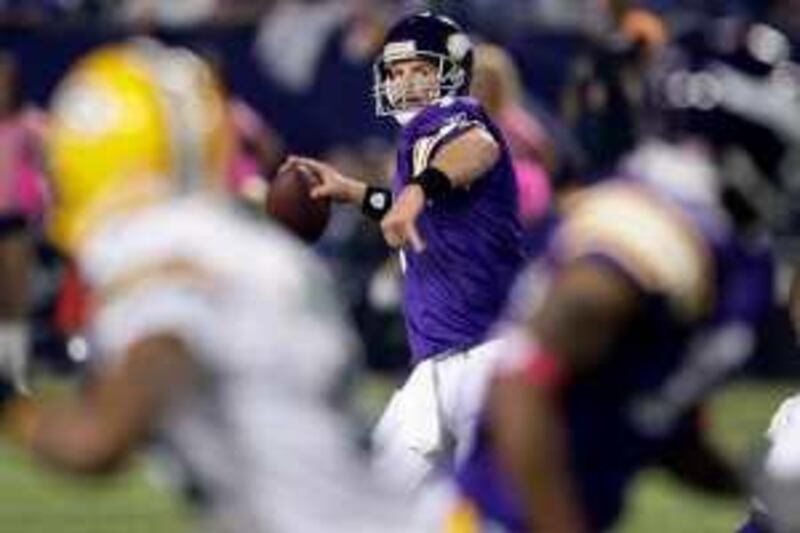 Minnesota Vikings quarterback Brett Favre throws during the first half of an NFL football game against the Green Bay Packers on Monday, Oct. 5, 2009, in Minneapolis. (AP Photo/Morry Gash)