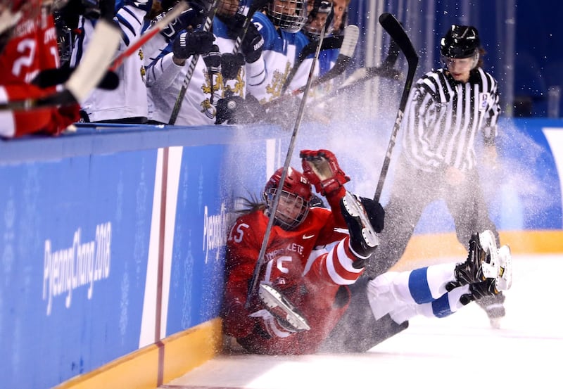 Valeria Pavlova representing Olympic Athletes from Russia and Finland's Minnamari Tuominen collide during the Women's Ice Hockey Bronze Medal game on day twelve of the 2018 Winter Olympic Games.  Jamie Squire / Getty Images