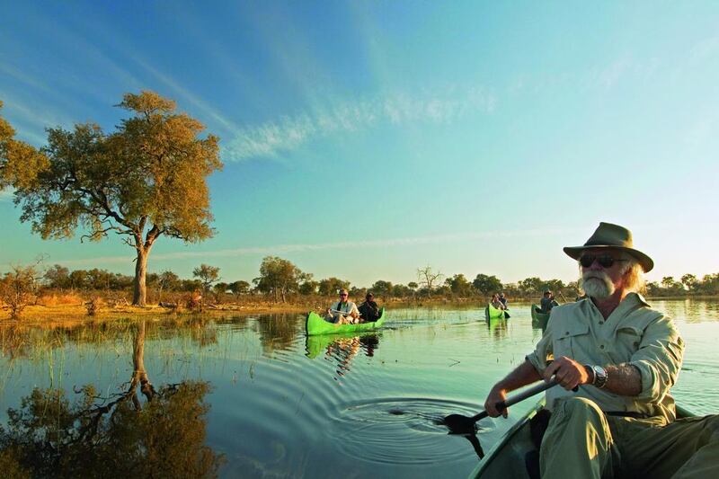 Active holidays, such as canoeing in Botswana, are becoming more popular. Beverly Joubert, National Geographic / Getty Images