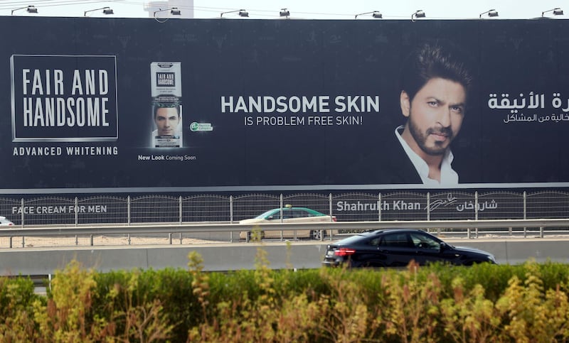 Dubai, United Arab Emirates - August 8, 2018: Skin cream poster with Shahrukh Khan on the E11. Wednesday, August 8th, 2018 at the E11, Dubai. Chris Whiteoak / The National