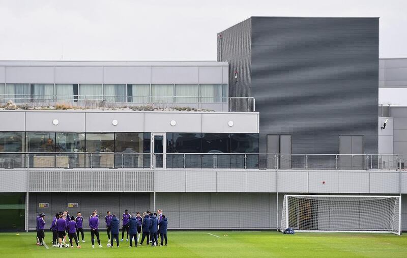 Manchester City manager Manuel Pellegrini addresses his team during Monday's Champions League training session. Laurence Griffiths / Getty Images