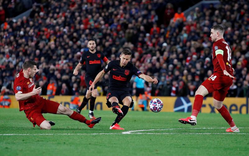 Atletico Madrid's Marcos Llorente scores their second goal. REUTERS