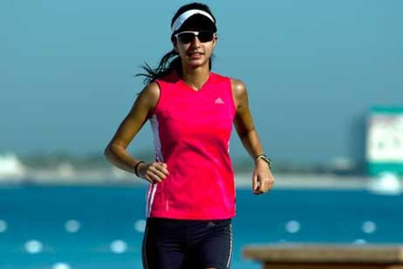Yasmin Wadhai trains on the Abu Dhabi Corniche ahead of the Adventure Challenge, which involves, among other disciplines, cycling, running and kayaking.