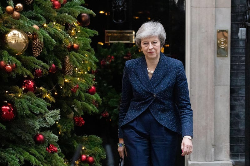 epa07225274 British Prime Minister Theresa May arrives to give a statement outside 10 Downing Street, central London, Britain, 12 December 2018. Theresa May will face a challenge to her leadership on 12 December 2018 after 48 letters calling for a contest were delivered to the Chariman of the 1922 Committee. May will find out her future after Conservative Members of Parliament vote between 18:00 GMT and 20:00 GMT later in the evening.  EPA/STR