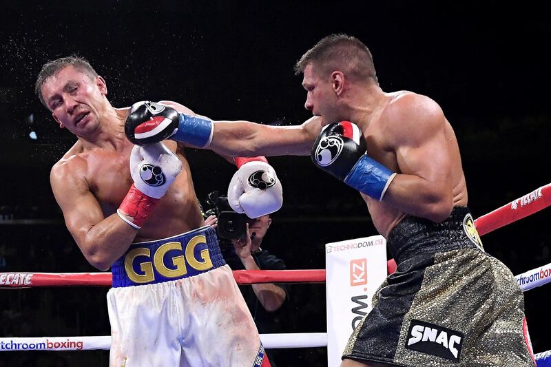 Sergiy Derevyanchenko punches Gennady Golovkin during their IBF middleweight title bout at Madison Square Garden. AFP