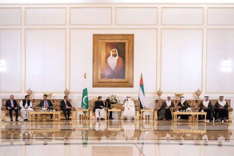 ABU DHABI, UNITED ARAB EMIRATES - September 19, 2018: HH Sheikh Mohamed bin Zayed Al Nahyan Crown Prince of Abu Dhabi Deputy Supreme Commander of the UAE Armed Forces (center R), receives HE Imran Khan Prime Minister of Pakistan (center L), during a reception at the Presidential Airport. Seen with HH Sheikh Abdullah bin Zayed Al Nahyan UAE Minister of Foreign Affairs and International Cooperation (R), HH Sheikh Hamed bin Zayed Al Nahyan, Chairman of the Crown Prince Court of Abu Dhabi and Abu Dhabi Executive Council Member (2nd R), HH Sheikh Mansour bin Zayed Al Nahyan, UAE Deputy Prime Minister and Minister of Presidential Affairs (3rd R), HH Lt General Sheikh Saif bin Zayed Al Nahyan, UAE Deputy Prime Minister and Minister of Interior (4th R) and members of the Pakistani delegation.

( Hamad Al Kaabi / Crown Prince Court - Abu Dhabi )
---