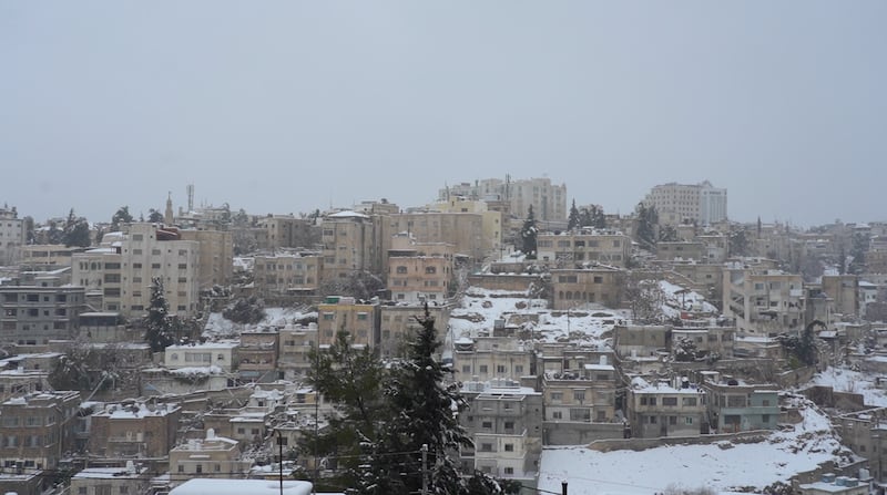 The rare snowfall was part of a cold snap in Jordan.