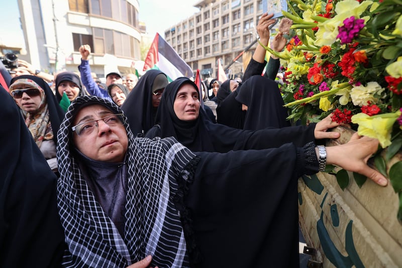 Mourners gather at the funeral procession in Tehran. AFP