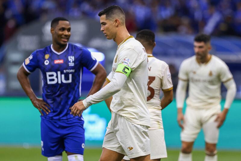 Al Nassr's Cristiano Ronaldo walks away after a missed chance. AFP