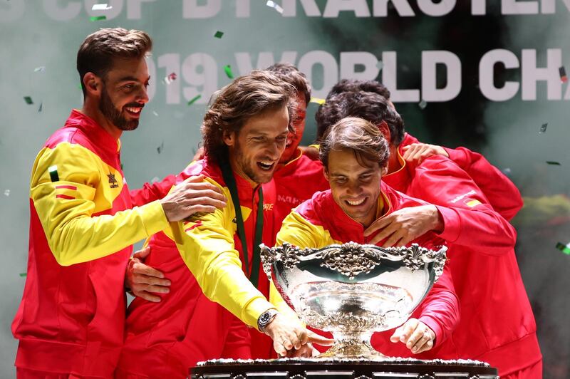 MADRID, SPAIN - NOVEMBER 24: (L-R) Marcel Granollers, Feliciano Lopez, Pablo Carreno Busta, Roberto Bautista Agut and Rafael Nadal celebrate with the trophy following their victory over Canada during Day Seven of the 2019 Davis Cup at La Caja Magica on November 24, 2019 in Madrid, Spain. (Photo by Clive Brunskill/Getty Images) *** BESTPIX ***