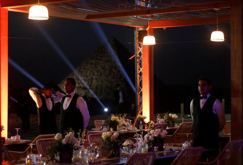 Egyptian waiters and employees of new restaurant called 9 Pyramids Lounge. Reuters