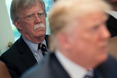 In this May 2018 file photo, US President Donald Trump speaks alongside then national security adviser John Bolton in Washington. AFP